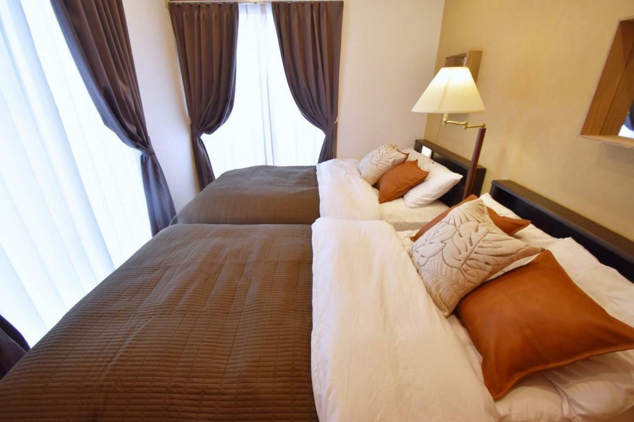 Guest House Tsukishiro Nanjō Extérieur photo