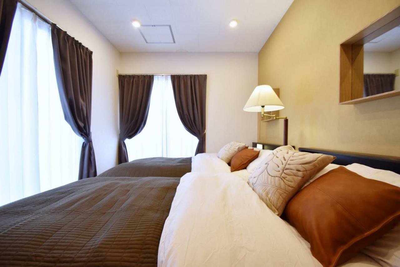 Guest House Tsukishiro Nanjō Extérieur photo