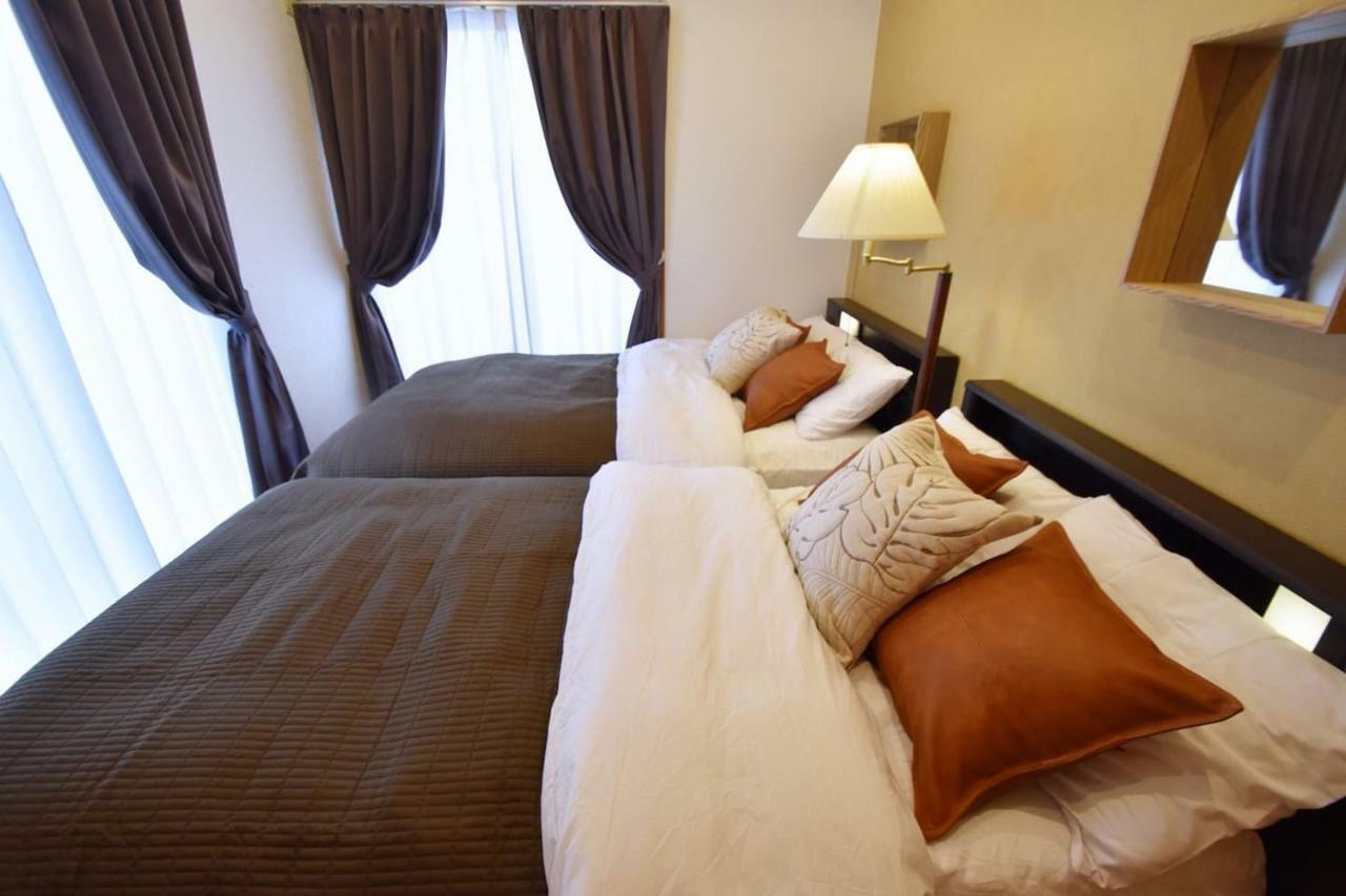 Guest House Tsukishiro Nanjō Extérieur photo